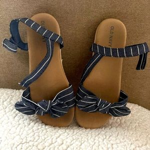 Blue sandals with white stripes